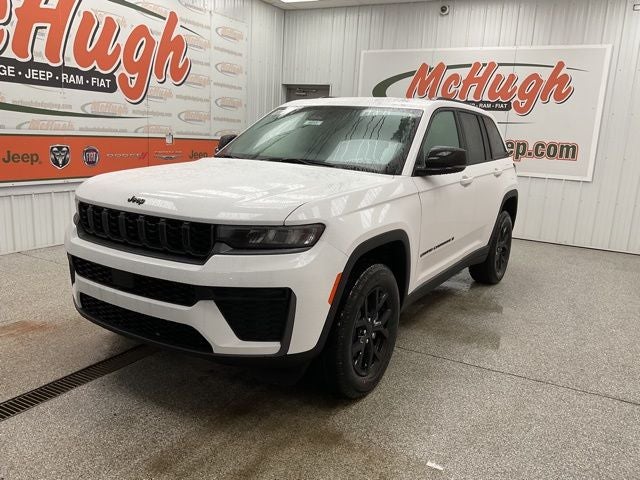 2026 Jeep Grand Cherokee GRAND CHEROKEE LAREDO ALTITUDE 4X4 in Bright White Clear-Coat Exterior Paint — front three-quarter view