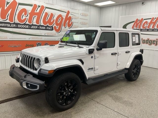 2025 Jeep Wrangler 4xe Sahara 4xe in Bright White Clearcoat — front three-quarter view