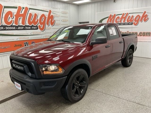 2024 RAM 1500 Classic Warlock Crew Cab 4x4 5'7' Box in Delmonico Red Pearlcoat — front three-quarter view