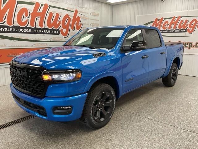 2026 RAM Ram 1500 RAM 1500 BIG HORN CREW CAB 4X4 5'7' BOX in Hydro Blue Pearl-Coat Exterior Paint — front three-quarter view