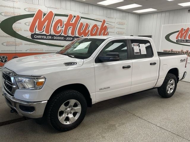 2023 RAM 1500 Big Horn Crew Cab 4x4 5'7' Box in Bright White Clearcoat — front three-quarter view