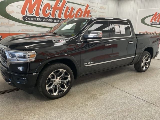 2022 RAM 1500 Limited Crew Cab 4x4 5'7' Box in Diamond Black Crystal Pearlcoat — front three-quarter view