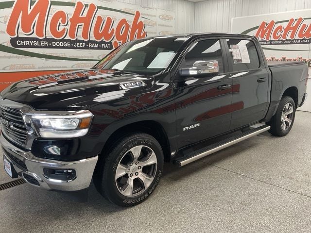 2023 RAM 1500 Laramie Crew Cab 4x4 5'7' Box in Diamond Black Crystal Pearlcoat — front three-quarter view