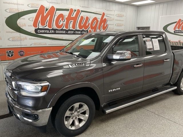 2021 RAM 1500 Laramie Crew Cab 4x4 5'7' Box in Granite Crystal Metallic Clearcoat — front three-quarter view