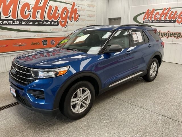 2021 Ford Explorer XLT in Atlas Blue Metallic — front three-quarter view