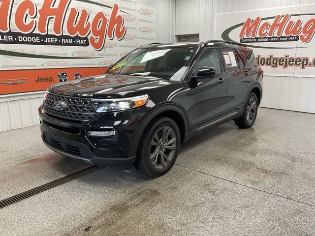 2023 Ford Explorer XLT in Agate Black Metallic — front three-quarter view