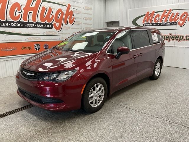 2023 Chrysler Voyager LX in Velvet Red Pearlcoat — front three-quarter view