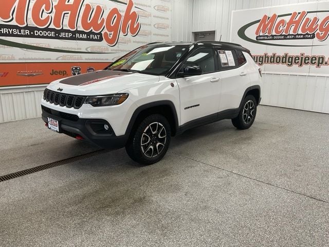 2025 Jeep Compass Trailhawk 4x4 in Bright White Clearcoat — front three-quarter view
