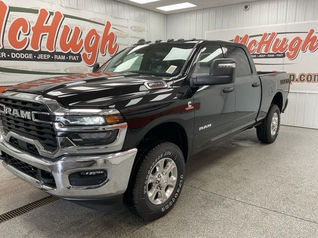 2026 RAM Ram 2500 RAM 2500 BIG HORN CREW CAB 4X4 6'4' BOX in Diamond Black Crystal Pearl-Coat Exterior Paint — front three-quarter view