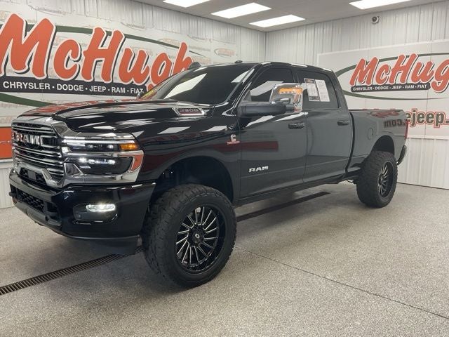 2026 RAM 2500 Laramie Crew Cab 4x4 6'4' Box in Diamond Black Crystal Pearlcoat — front three-quarter view
