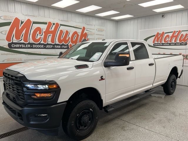 2026 RAM Ram 2500 RAM 2500 TRADESMAN CREW CAB 4X4 8' BOX in Bright White Clear-Coat Exterior Paint — front three-quarter view