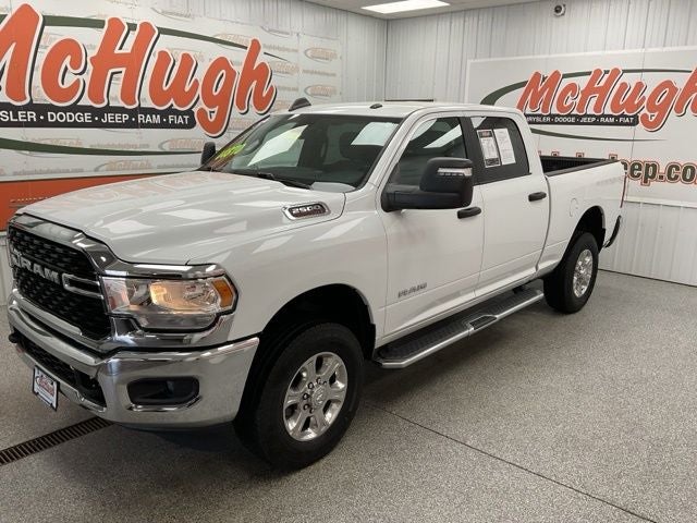 2024 RAM 2500 Big Horn Crew Cab 4x4 6'4' Box in Bright White Clearcoat — front three-quarter view