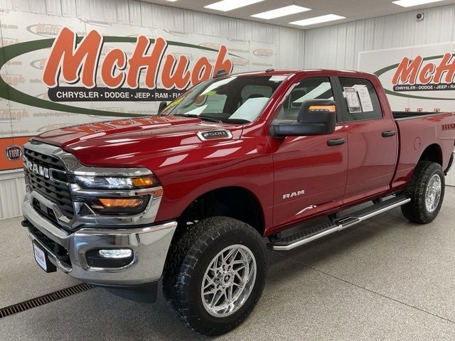 2026 RAM 2500 Big Horn Crew Cab 4x4 6'4' Box in Molten Red Pearlcoat — front three-quarter view