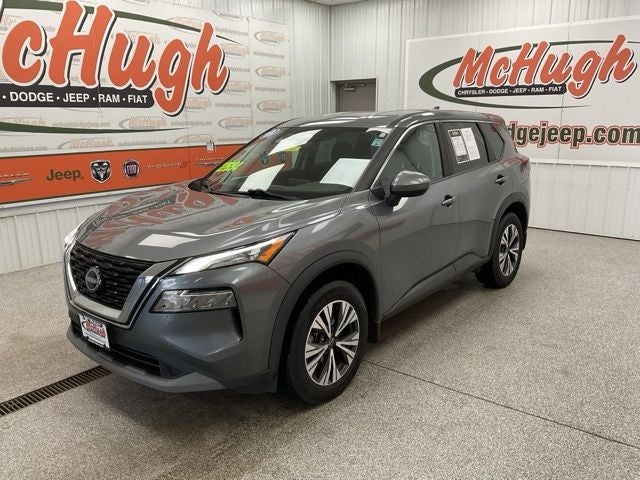 2023 Nissan Rogue SV Intelligent AWD in Gun Metallic — front three-quarter view